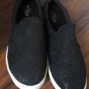 Black sparkly croc shoes